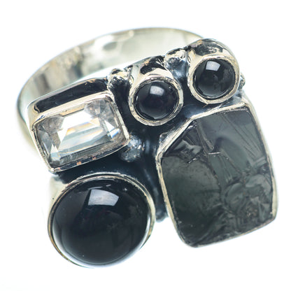 Sterling silver ring with black onyx and clear diamond accents