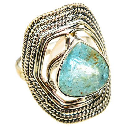 Sterling silver ring featuring rough aquamarine teardrop gemstone in open frame