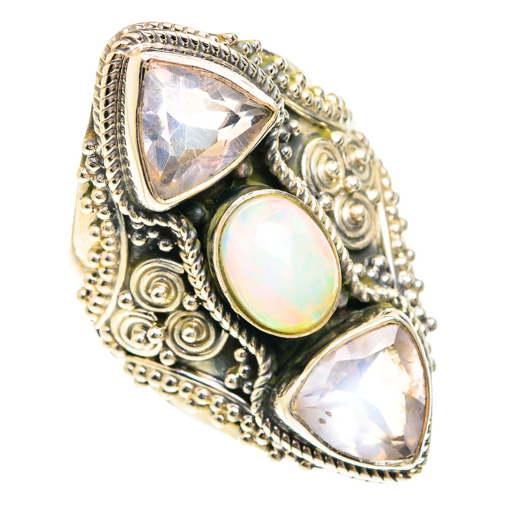Sterling silver filigree gemstone ring with round iridescent opal and two faceted triangle stones