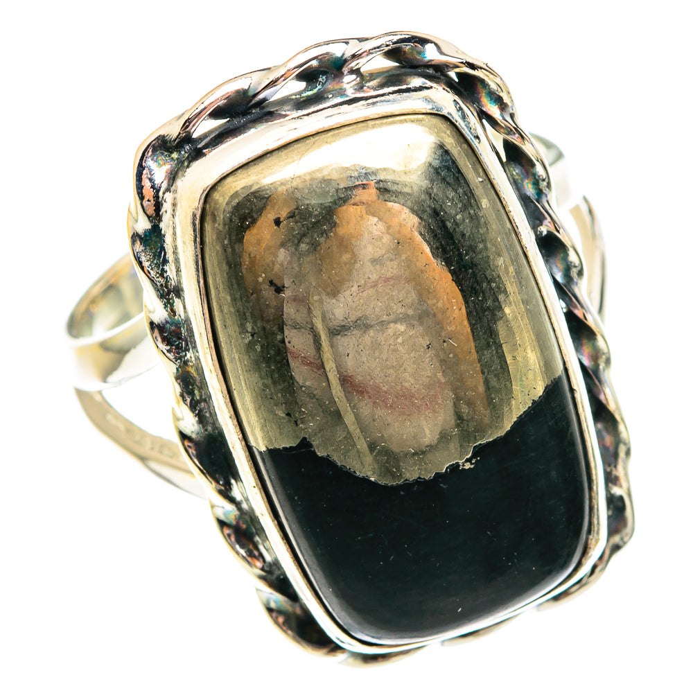 Sterling silver oval onyx ring with gold-fleck setting, dark reflective stone