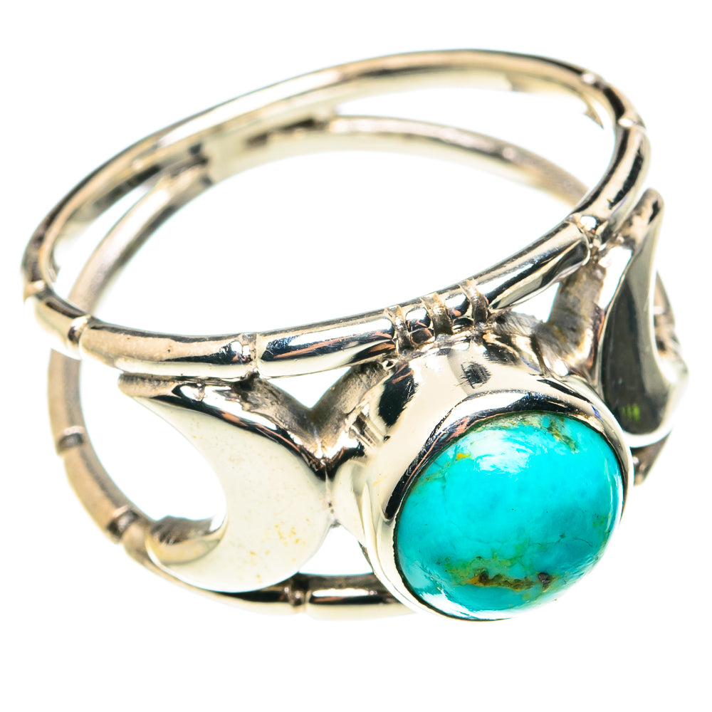 Sterling silver ring with turquoise oval cabochon, ornate raised bezel and split shank.