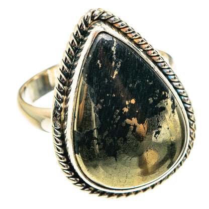 Teardrop onyx ring in black with gold flecks, ornate silver rope setting