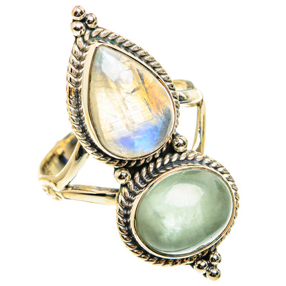 Sterling silver ring with teardrop rainbow moonstone and oval green gemstone, rope bezel