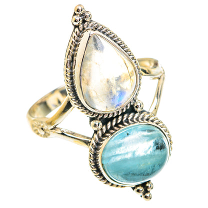 Teardrop rainbow moonstone and blue aquamarine silver ring with braided bezel setting