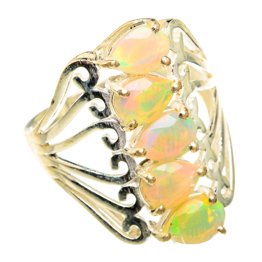 Sterling silver opal ring with large faceted oval Ethiopian opal and openwork band