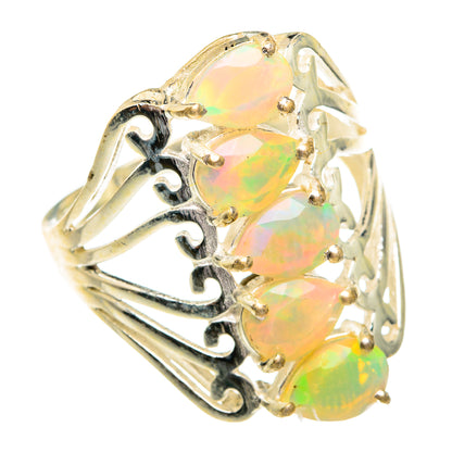 Sterling silver opal ring with large faceted oval Ethiopian opal and openwork band
