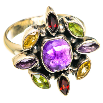 Sterling silver gemstone ring with large purple oval center, oval red, green, yellow stones