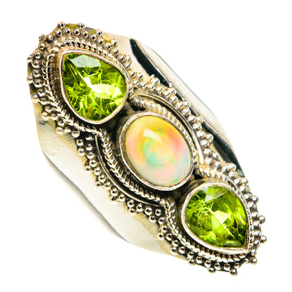 Sterling silver statement ring with scalloped borders and three oval stones, peridot and opal