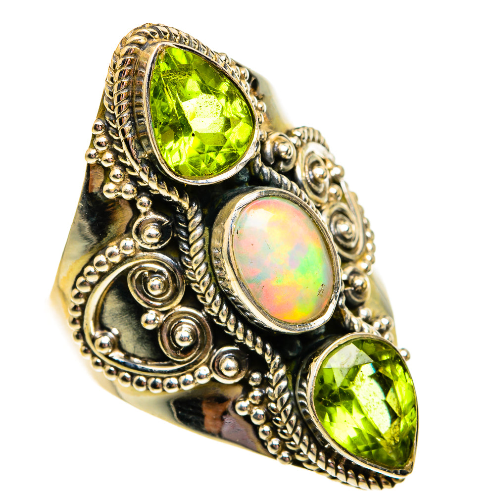 Silver statement ring with large green peridot oval stones and oval opal cabochon