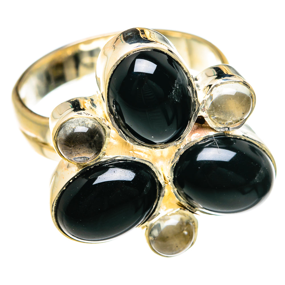 Sterling silver ring with three oval black onyx stones and small round clear accents
