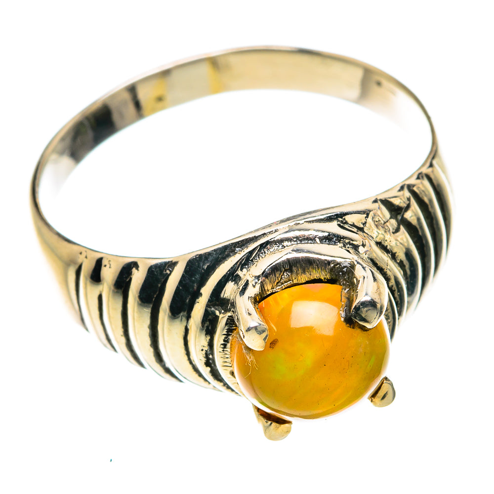 Sterling silver ring with golden opal bezel and carved wave band