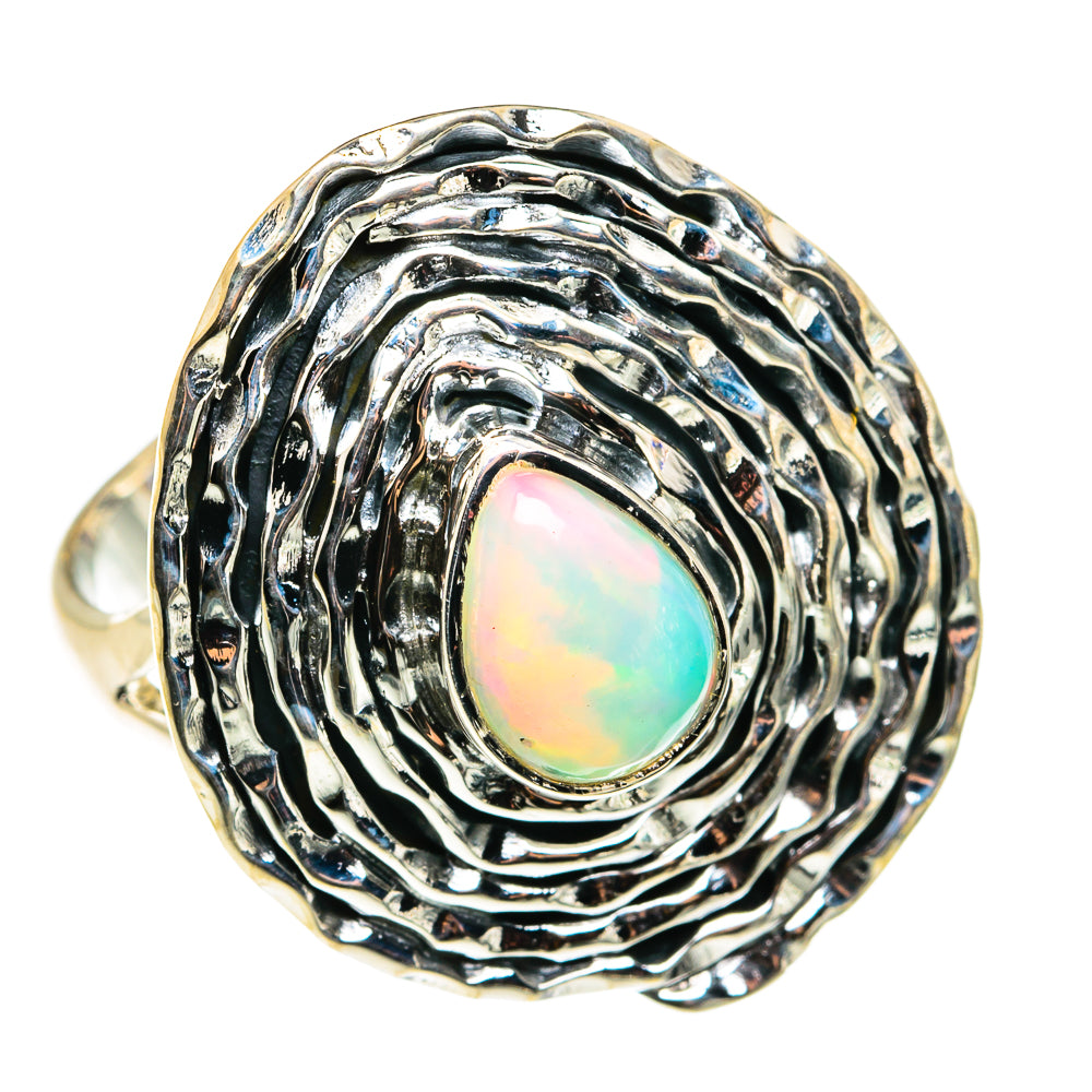 Sterling silver opal ring with oval Ethiopian opal and swirl-textured band