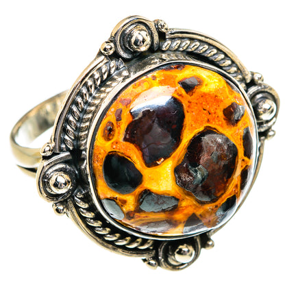 Sterling silver ring with oval bauxite cabochon, orange and black stone pattern