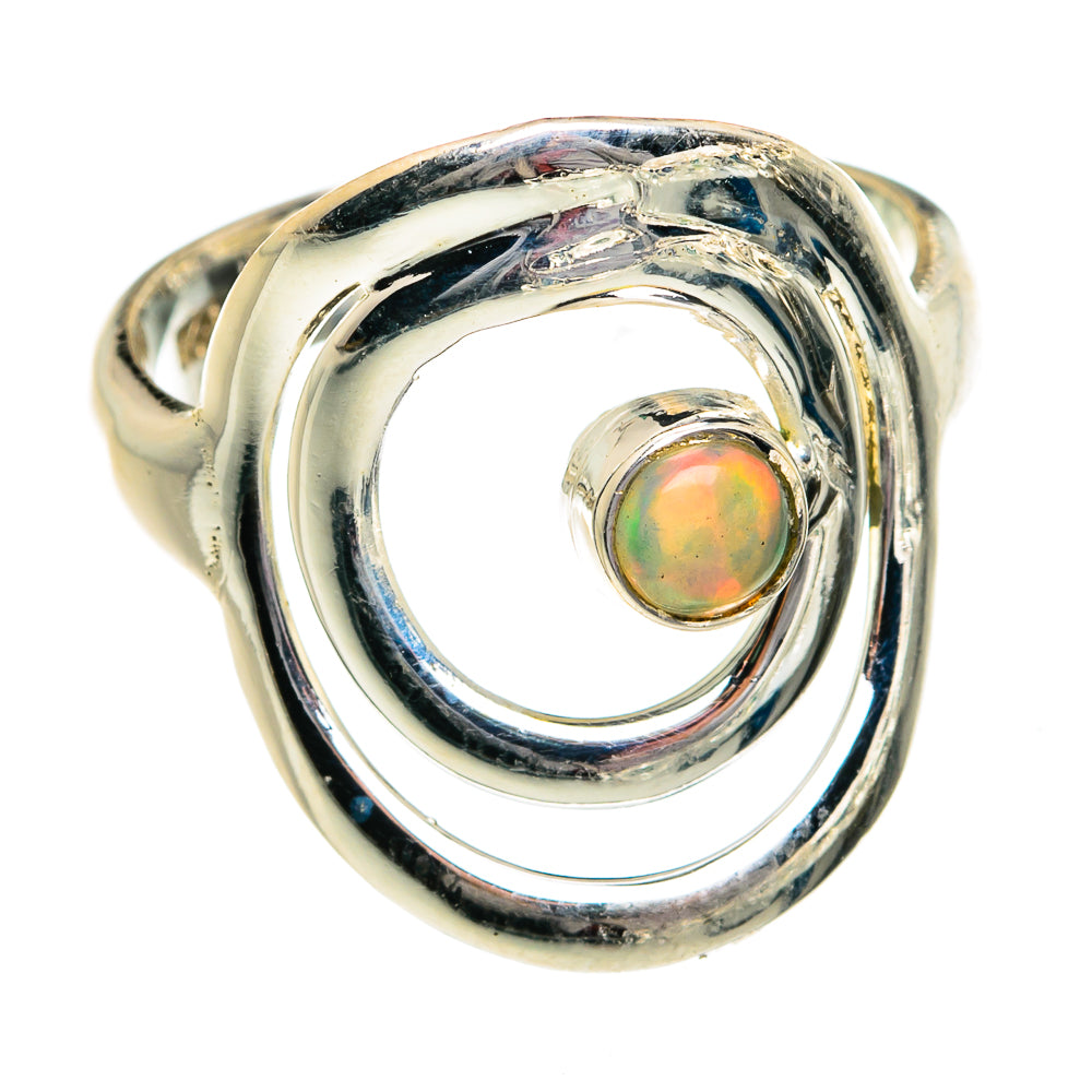 Silver opal ring with round Ethiopian opal in swirling openwork setting