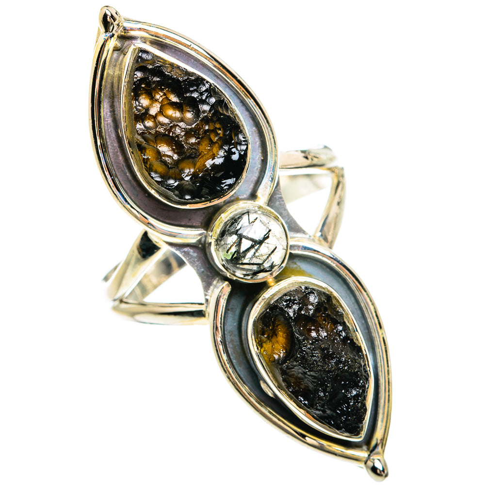 Sterling silver ring with three prong-set teardrop stones, one round crystal detail