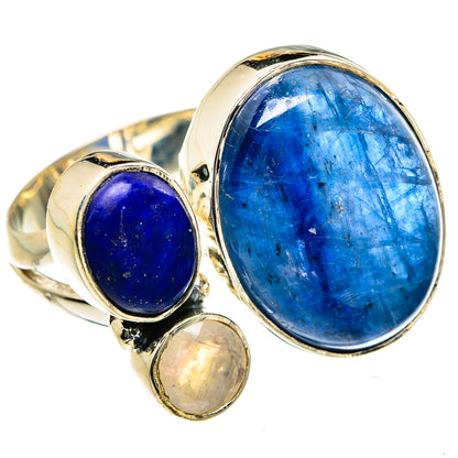 Silver adjustable ring with large oval blue gemstone and two smaller stones, one opalescent