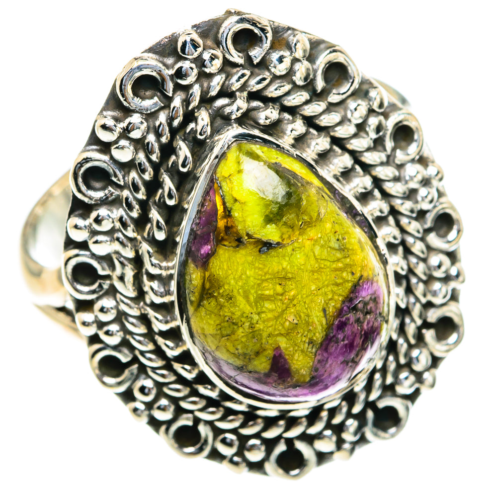 Sterling silver ring with oval yellow-green and purple cabochon, textured scroll band