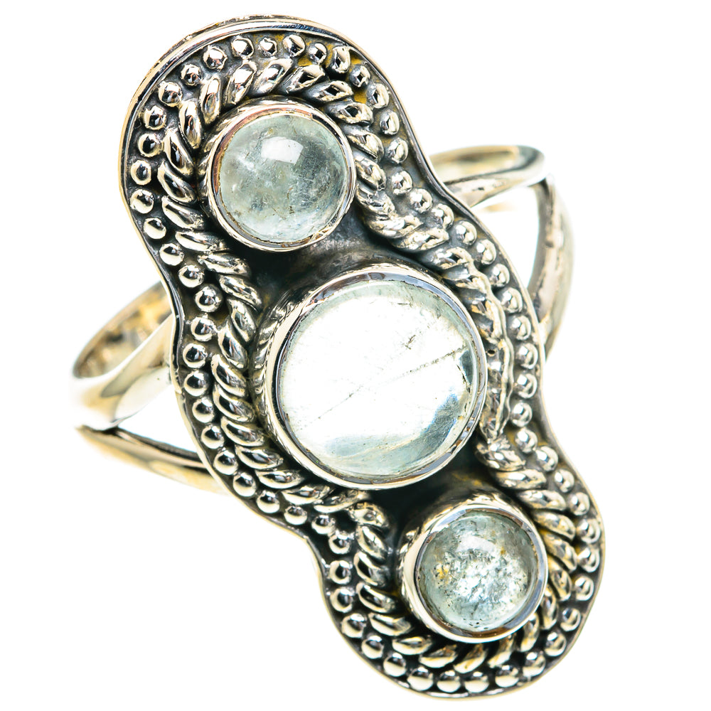 Sterling silver aquamarine ring, oval band with three round bezel-set stones, side view