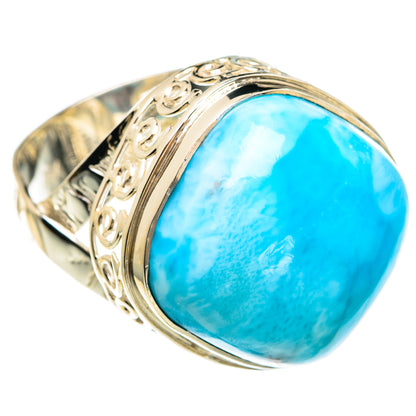 Turquoise larimar cabochon ring with ornate silver band, oval stone bezel