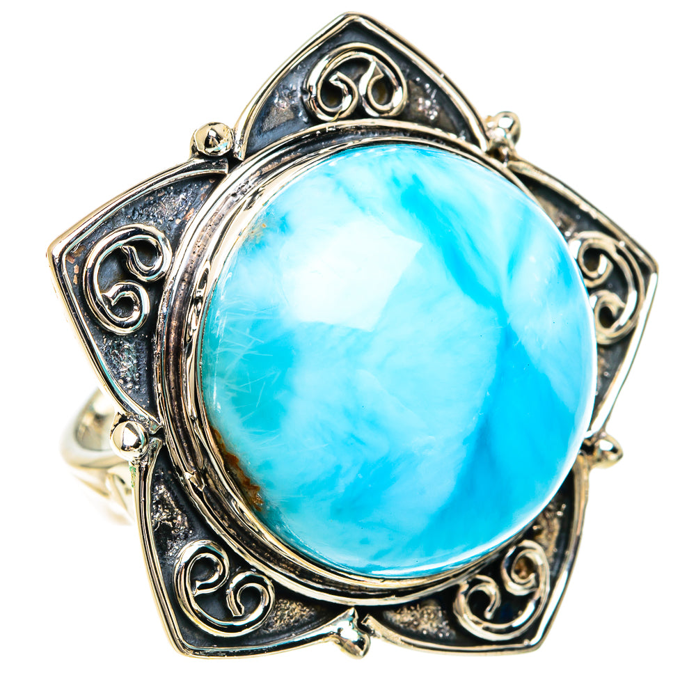 Ornate sterling silver ring with oval blue larimar cabochon center stone