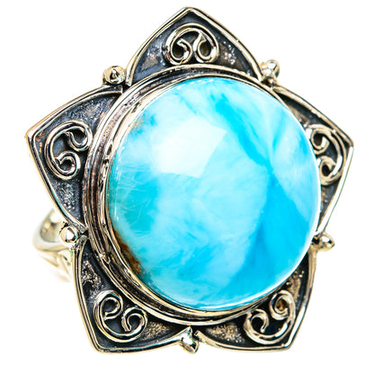 Ornate sterling silver ring with oval blue larimar cabochon center stone