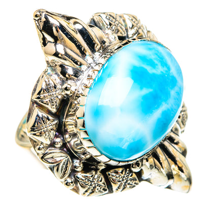 Sterling silver statement ring with oval blue larimar center and engraved band
