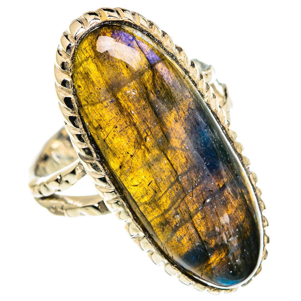 Oval labradorite ring with gold and blue shimmer, silver bezel and decorative band