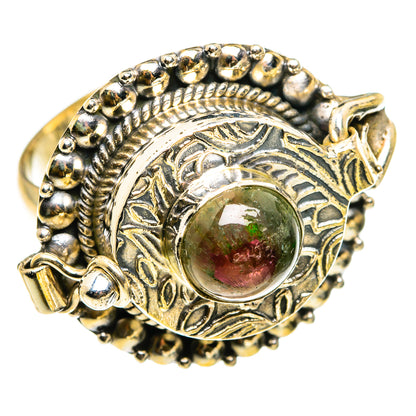 Sterling silver gemstone ring with oval engraved halo and green-red cabochon center