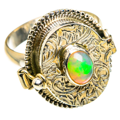 Sterling silver ring with green opal cabochon center and engraved circular frame