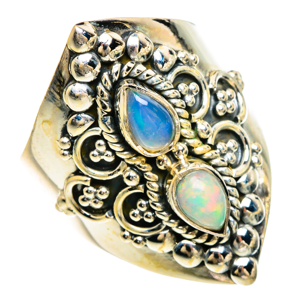 Sterling silver opal ring with blue opal oval center and decorative bead filigree