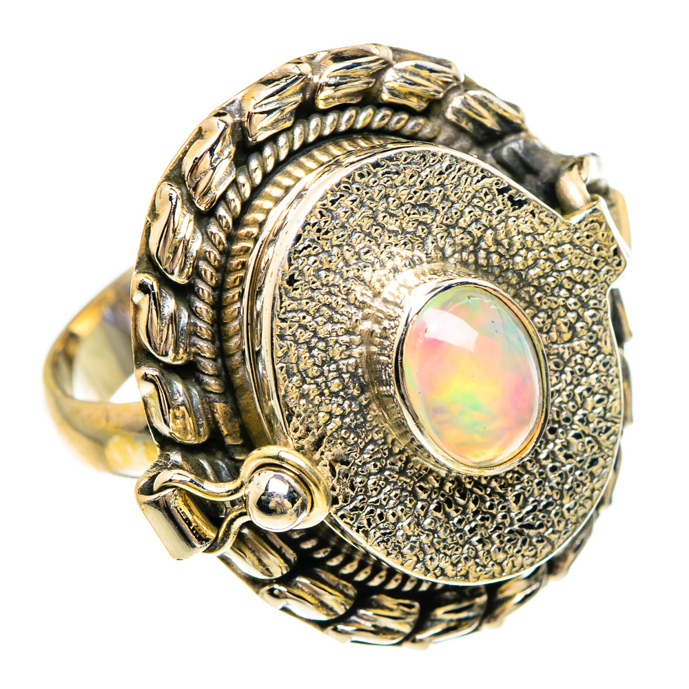 Sterling silver opal ring with round iridescent cabochon and ornate etched band