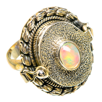 Sterling silver opal ring with round iridescent cabochon and ornate etched band