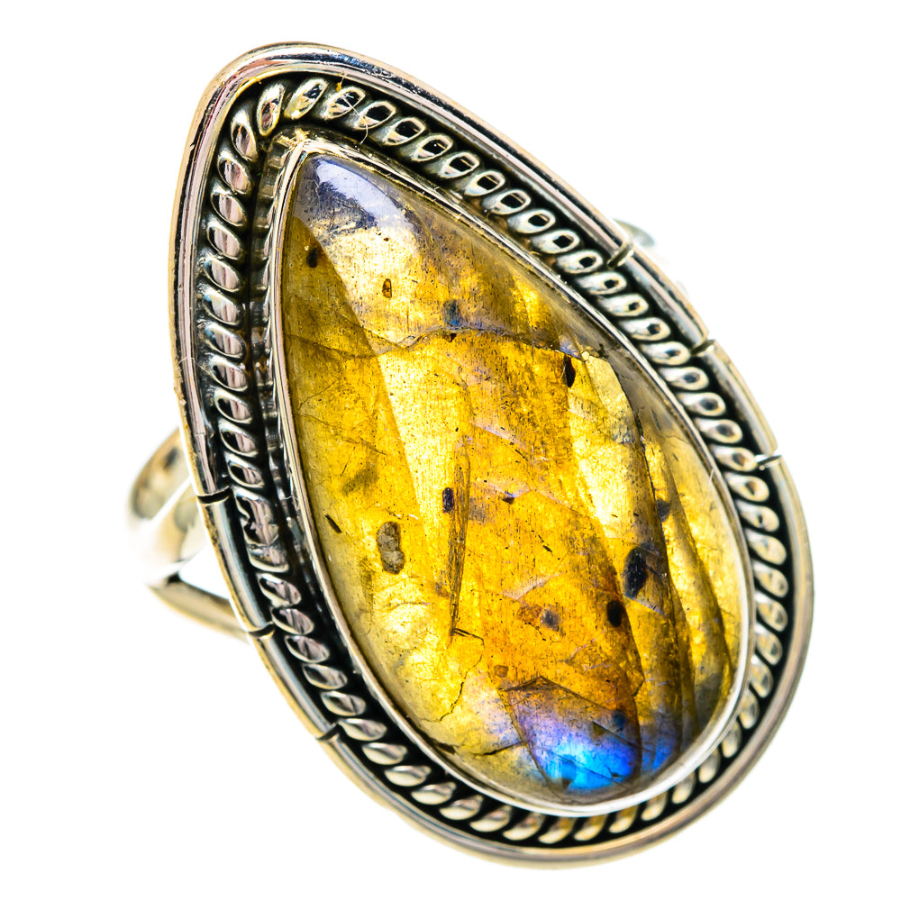 Sterling silver labradorite oval ring with yellow-gold gemstone and blue flash