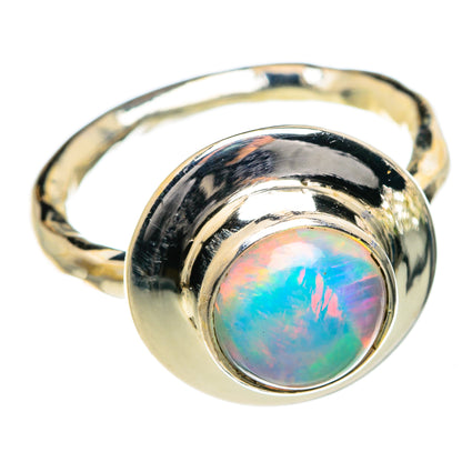 Sterling silver opal ring with oval bezel, iridescent blue-green and pink gemstone