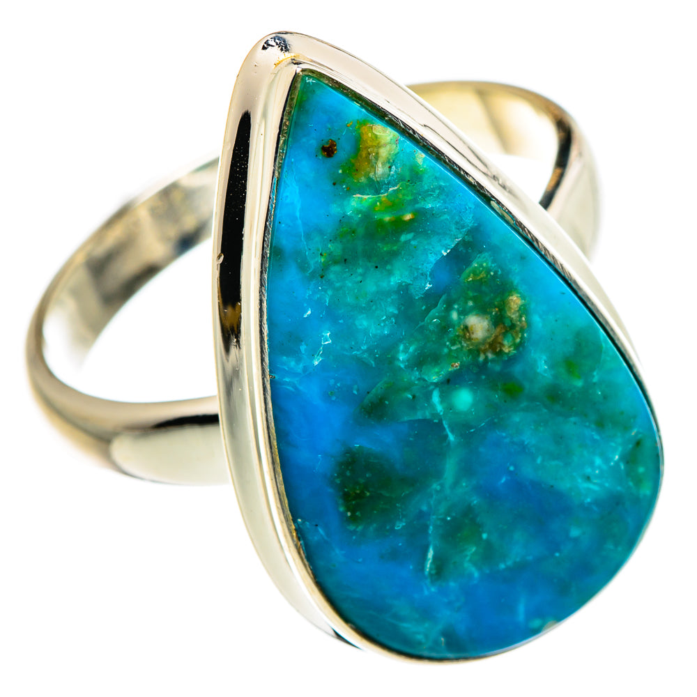 Teardrop-style blue opal ring in silver setting, side view