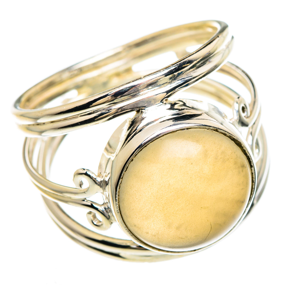 Sterling silver moonstone ring with round gold cabochon, open side setting
