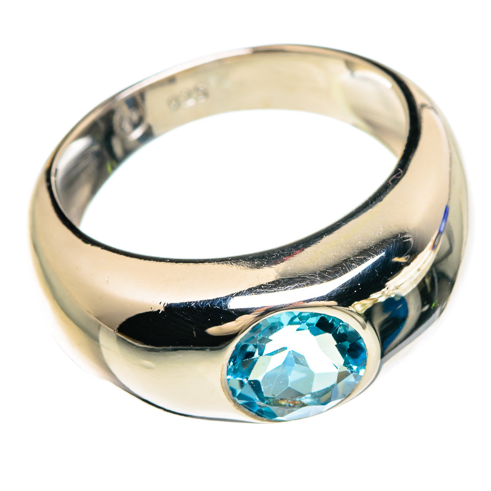 Sterling silver ring with oval blue topaz gemstone, polished band