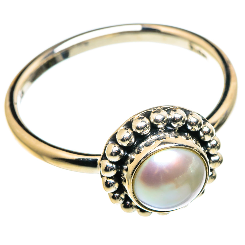 Cultured pearl ring with round iridescent pearl and bead halo on polished metal band