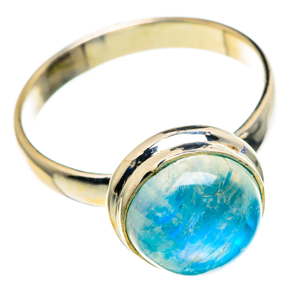 Polished sterling silver ring with oval blue rainbow moonstone cabochon.