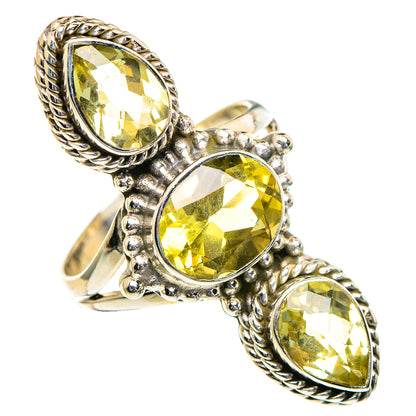 Sterling silver three-stone ring with faceted oval yellow citrine and rope bezels