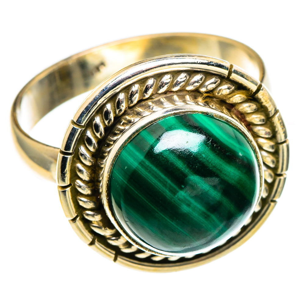 Malachite cabochon ring with oval green stone, braided-style bezel, and band