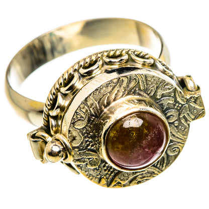 Sterling silver tourmaline ring with round purple-pink stone and ornate bezel
