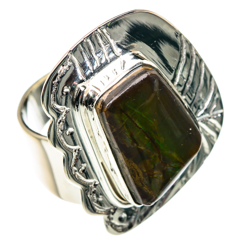 Sterling silver ring with rectangular color-change gemstone, green tones in dark setting