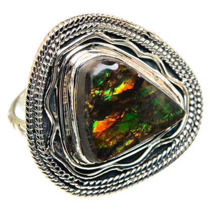 Sterling silver ring with ammolite stone, vivid green and orange flashes, raised border