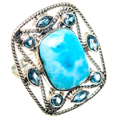 Sterling silver ring with large oval turquoise cabochon and blue oval accents