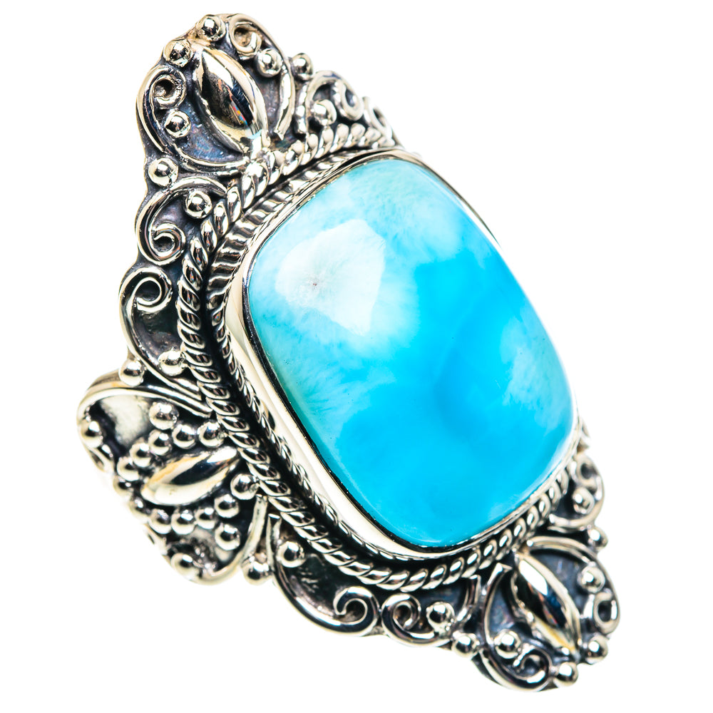 Sterling silver ring with oval blue larimar-style gemstone and ornate filigree setting