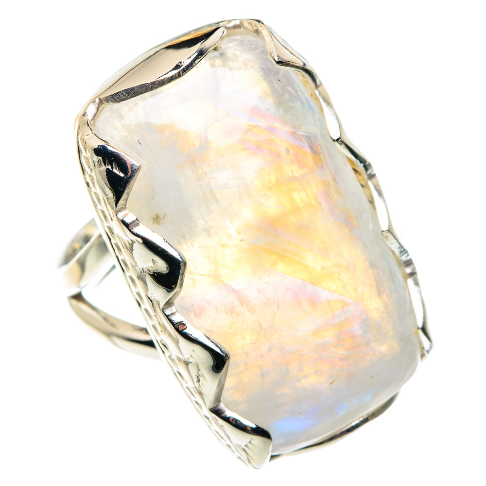 Oval opal-like moonstone set in sterling silver ring with scalloped metal edges