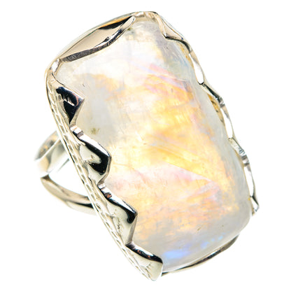 Oval opal-like moonstone set in sterling silver ring with scalloped metal edges