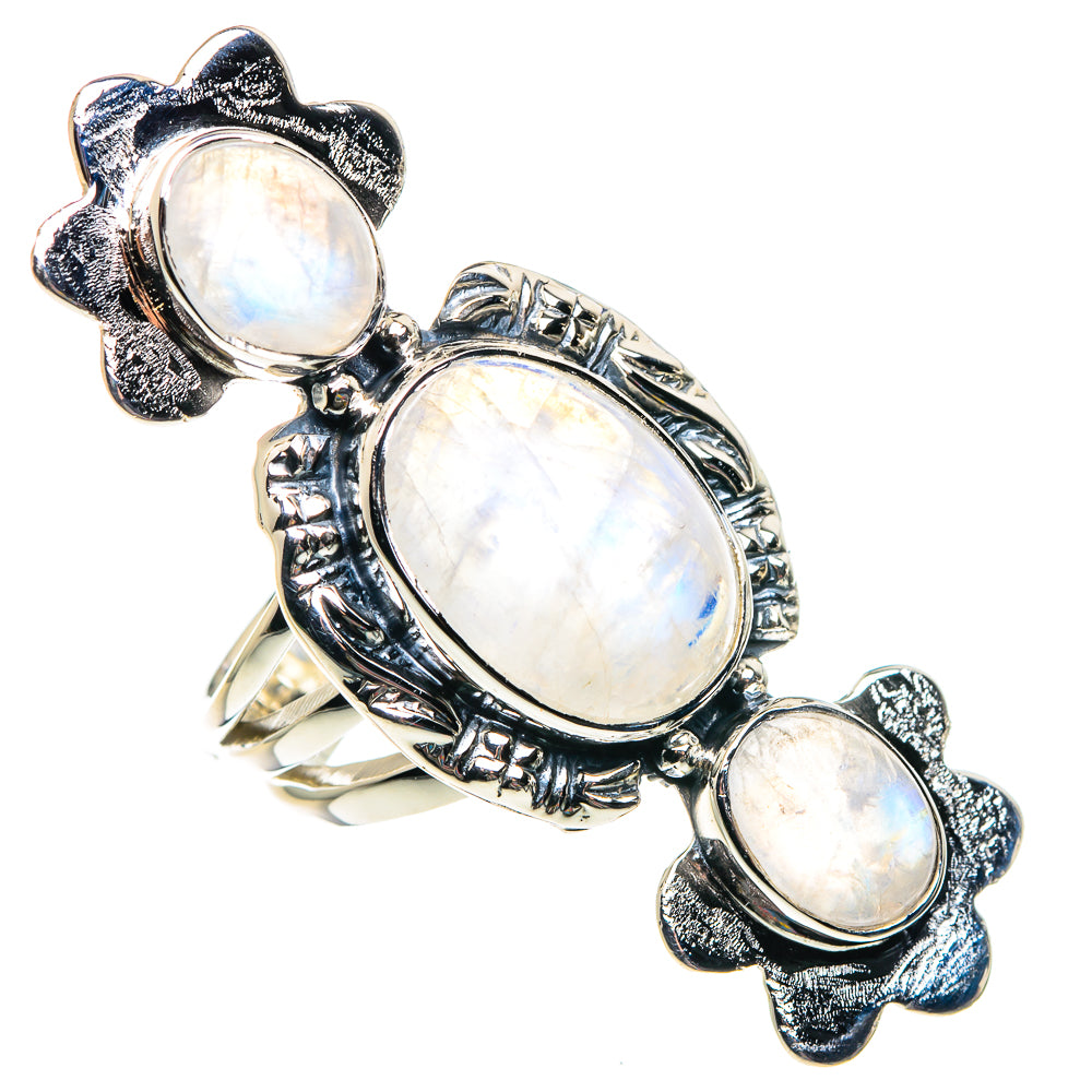 Sterling silver oval moonstone ring with three iridescent stones and decorative prongs