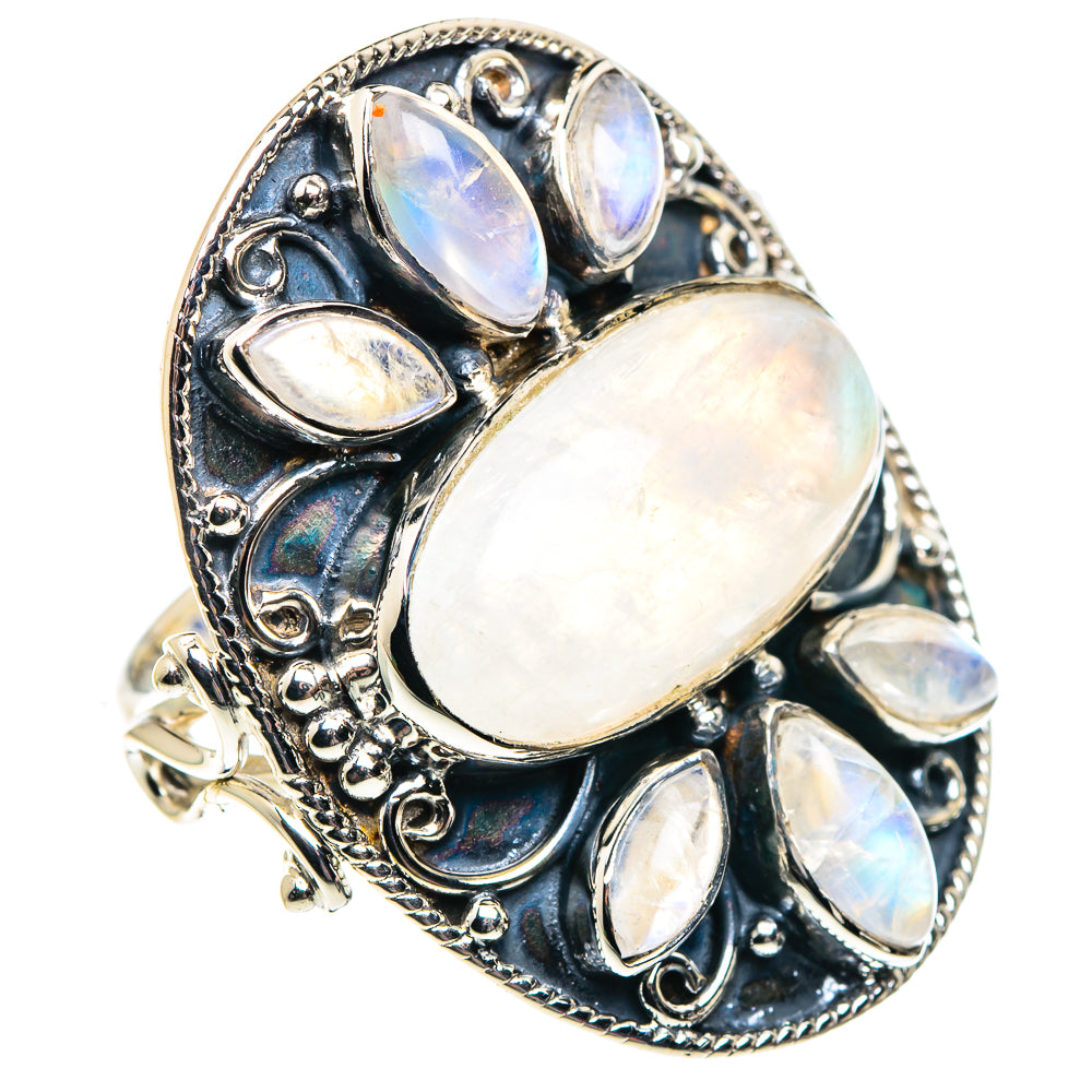 Sterling silver oval moonstone center ring with multiple opal-like side stones